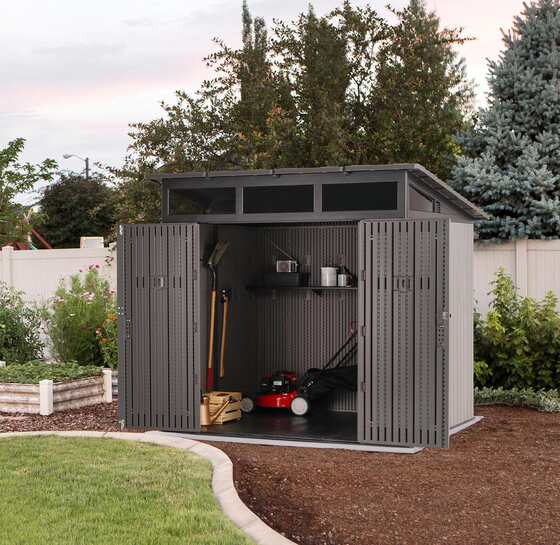 Wide-door, space-saving shed for organizing outdoor tools, equipment, and seasonal items.