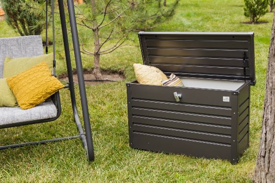 This metal deck box opens wide for easy storage.