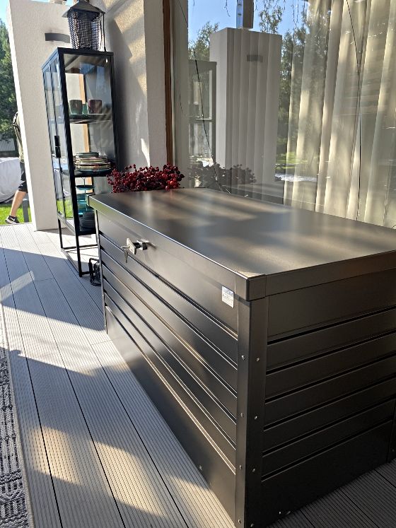 The Biohort Leisure Time metal deck box perfectly fits inside your home too!
