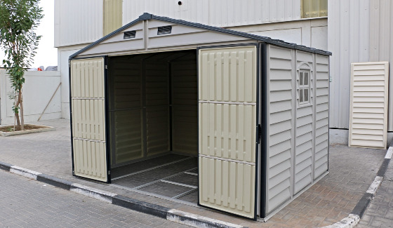 The DuraMax Woodside Plus 10.5x8 Vinyl Storage Shed Comes with Wide Double Doors That Can Easily Store All Your Outdoor Equipment, Tools, Gardening Supplies, and More with Ease!