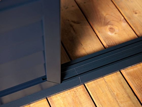 Sealed track helps keep insects and debris out while enabling smooth door operation.