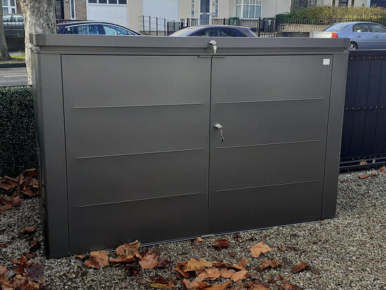 Biohort HighBoard is a weatherproof, lockable steel cabinet with double doors and a lift-up lid.
