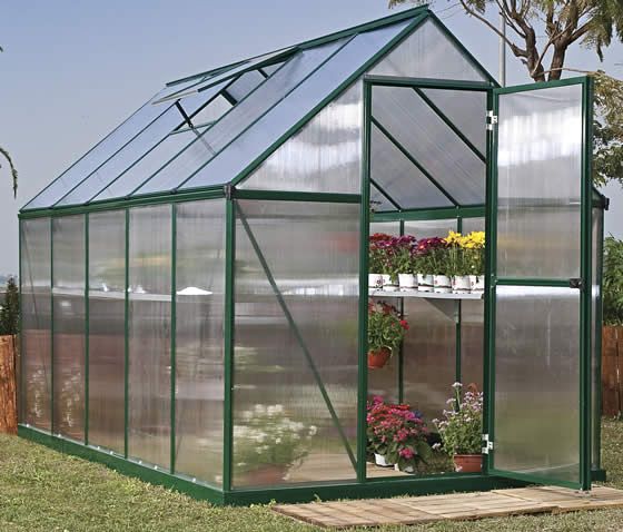 Build your perfect garden sanctuary with a spacious, sunlit greenhouse interior.