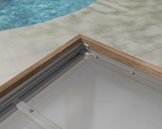 It features an integrated gutter system designed to efficiently channel rainwater away from your patio.