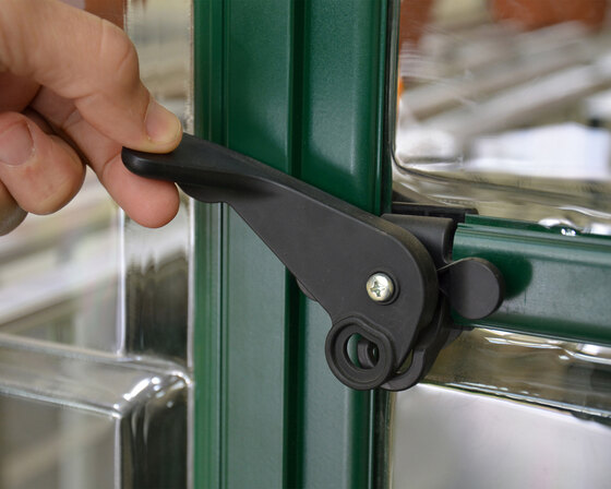 Lockable door handle with a magnetic catch for secure, convenient access.